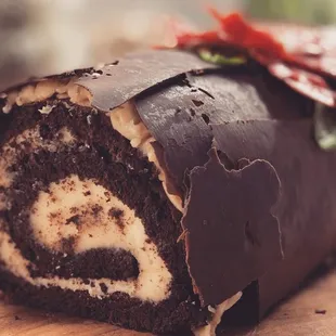 a chocolate roll with cream filling