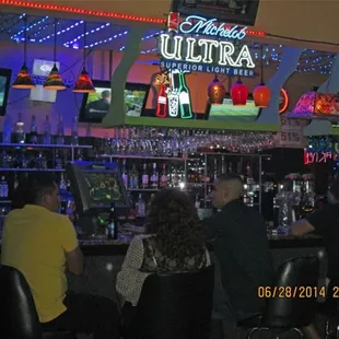 people sitting at the bar