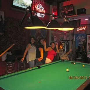 people playing pool