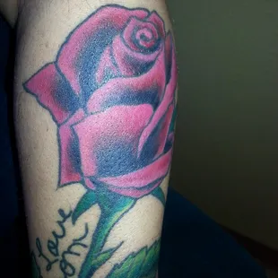 This is my favorite! Sam tattooed my mom's handwriting on me as a memorial to her