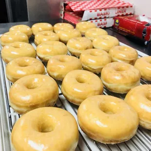 glazed donuts on a cooling rack