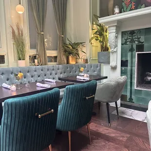 a dining room with a fireplace