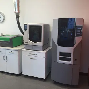 3D printers and laser cutting station. You bring in the design and they will print it.