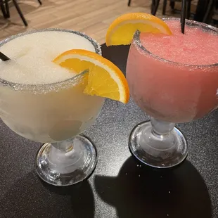 Large peach and raspberry margarita, frozen with sugar rim