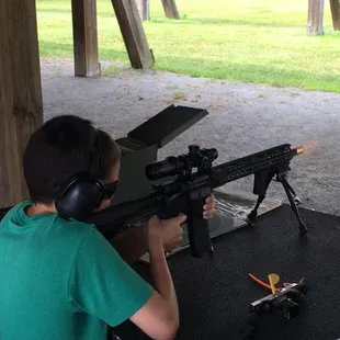 My son shooting my Triton AR-15 at C2 Shooting Center built by Chris at DOA Arms.