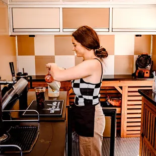 a woman in a kitchen