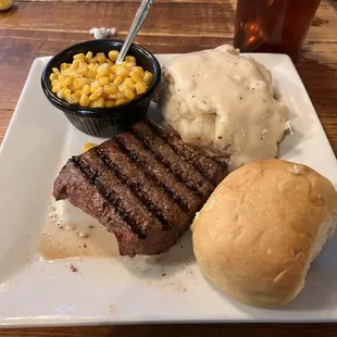 Flat iron steak, masked potatoes and butter corn