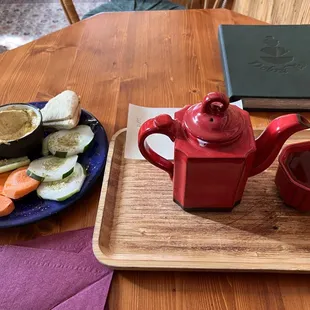 Hummus plate and pot of vanilla tea