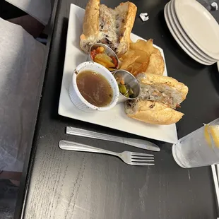 Italian beef sandwich with peppers on the side