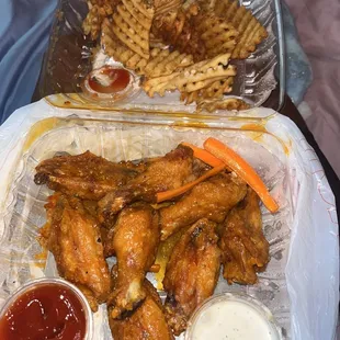 Hot wings and waffle fries