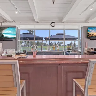 a bar with a view of the ocean