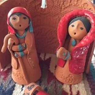 two figurines of native americans