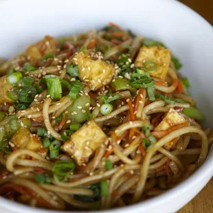 Japanese Teriyaki Udon: carrots, bok choy, onions and udon noodles stir fried in teriyaki sauce with choice of protein (tofu pictured here)