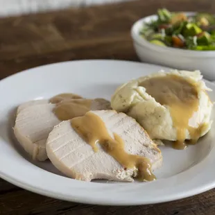 slow roasted turkey entree with white cheddar mashed potatoes
