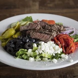 Dr. Greek with sliced beef tenderloin