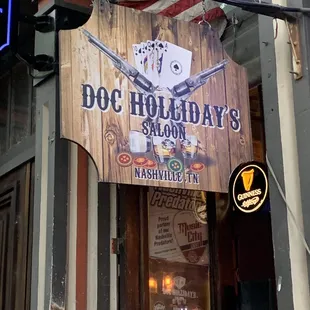 a sign for doc holliday&apos;s saloon