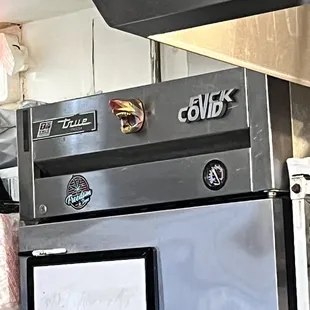 a commercial kitchen with stainless steel appliances