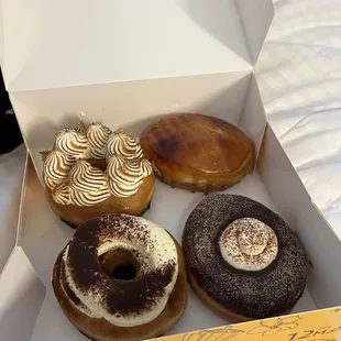 Tres leches donut , passion fruit crème brûlée , tiramisu and Mexican hot chocolate