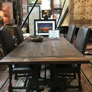 We make custom farmhouse tables from reclaimed wood &amp; iron metal bases.