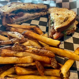 a plate of fries and a sandwich