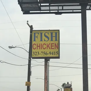a fish and chicken sign