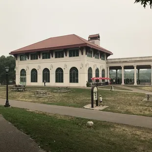 a large white building with a red roof