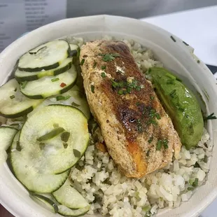 Fit Fish Bowl - forgot the price but very filling. Cilantro lime Cauliflower rice with salmon, cucumbers and avocado.