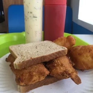Small fish on rye with hush puppies.