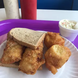 Small fish on rye, hush puppies and coleslaw.