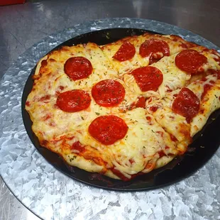 Pepperoni and cheese pizza