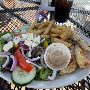 Marinated chicken with greek salad/fries
