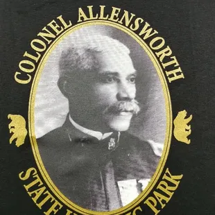 Halftone black and white image with gold trim. 3 color print.