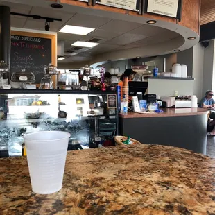 a cup of coffee on a counter