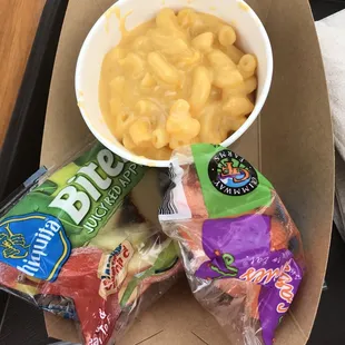 Kids mac n cheese includes a veggie, fruit and a drink