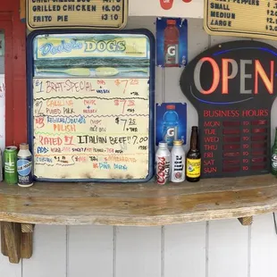 a man standing in front of a bar