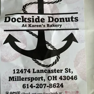 a sign for a donut shop