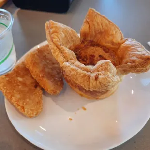 Stale hashbrowns and a weird flavorless ham and cheese croissant thing.