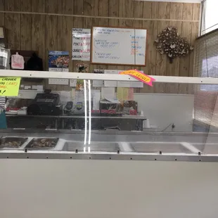 a counter with a sign on it