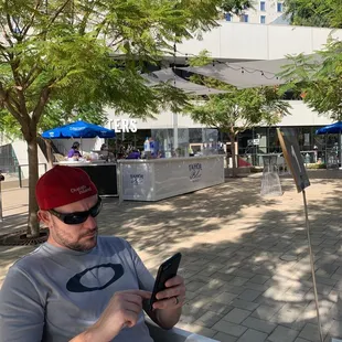 Outdoor bar, next to the DJ space.