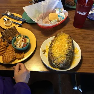 3 lb Smokin Tater Cheddar cheese Pulled Pork and a football size tator....  634 River Ridge Plaza Brandenburg Ky