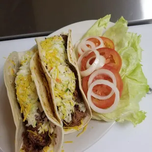 Doc's Brisket tocos With Cheddar cheese and delicious homemade slaw Docs BBQ Smoke Shack  634 River Ridge Plaza Brandenburg Ky