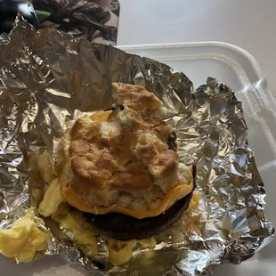 Sausage egg and cheese biscuit.  Took a bite before picture
