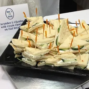 a platter of sandwiches