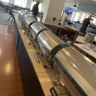 a restaurant with a long buffet