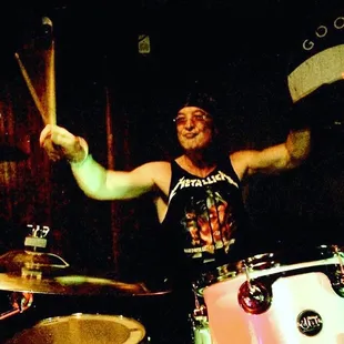 a man playing drums