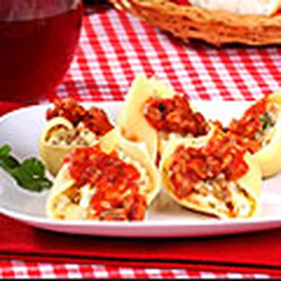 a plate of stuffed tortillas