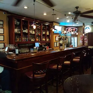The bar area has three large televisions showing different channels. Great for watching the big game or whatever.
