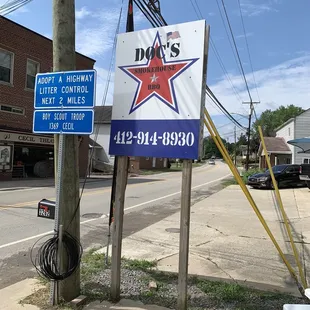 a sign on the corner of a street