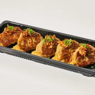 Pork Gyoza - shiitake, cabbage, spicy chili garlic crunch