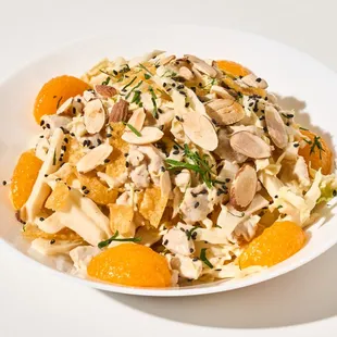 Crunchy chicken salad - napa cabbage, crispy wonton, mandarin, black sesame seeds, almonds, parsley, sesame dressing